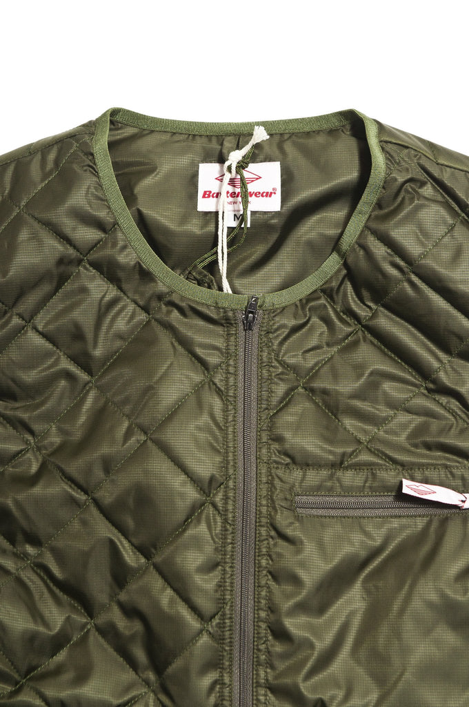 Battenwear Quilted Travel Vest Olive at shoplostfound in Toronto, collar