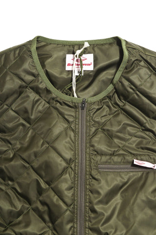 Battenwear Quilted Travel Vest Olive at shoplostfound in Toronto, front