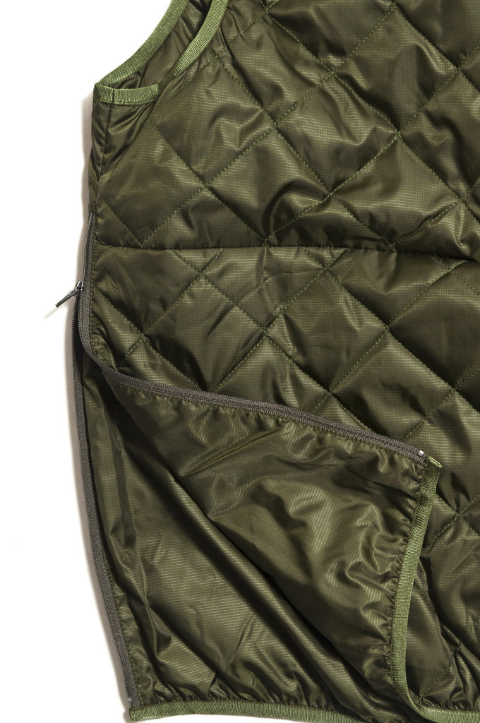 Battenwear Quilted Travel Vest Olive at shoplostfound in Toronto, side zip