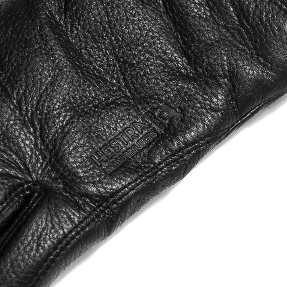 Norse Projects Hestra Utsjo Black Gloves at shoplostfound in Toronto, close up of debossed branding