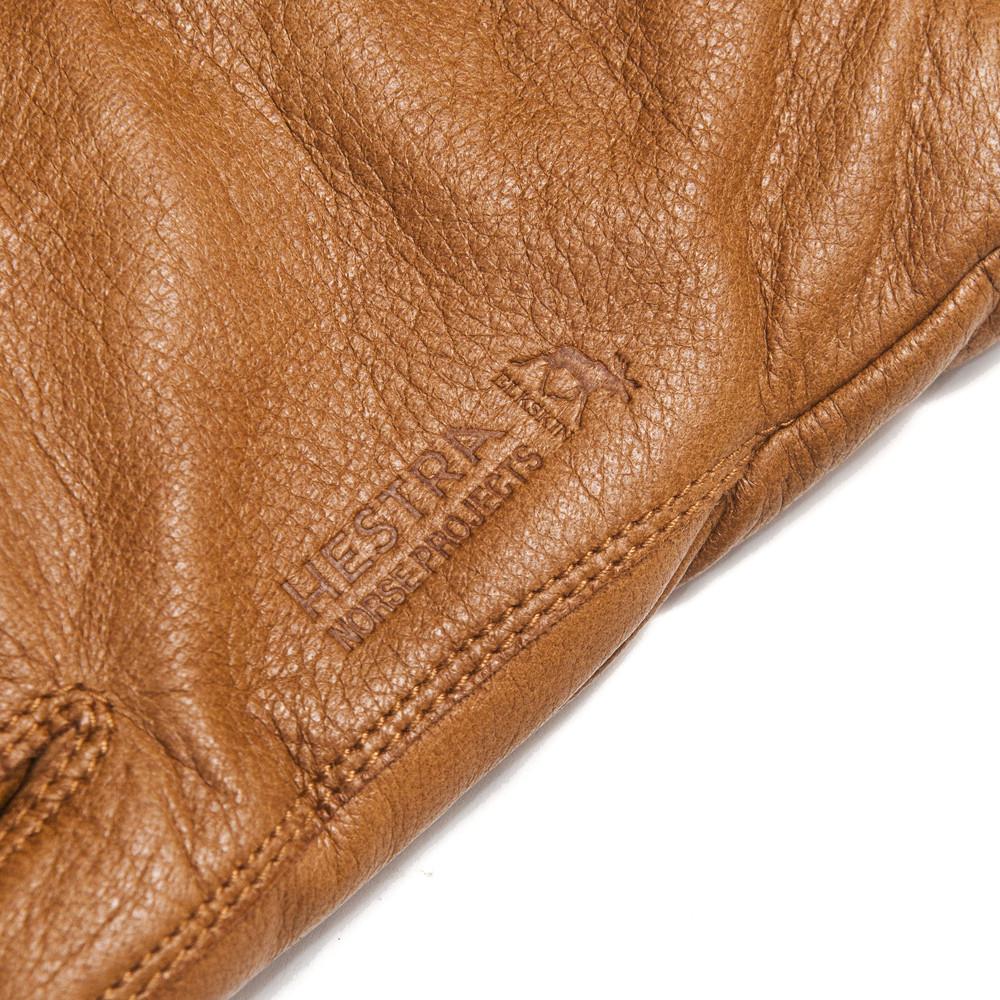 Norse Projects Hestra Utsjo Tobacco Gloves at shoplostfound in Toronto, close up of debossed branding